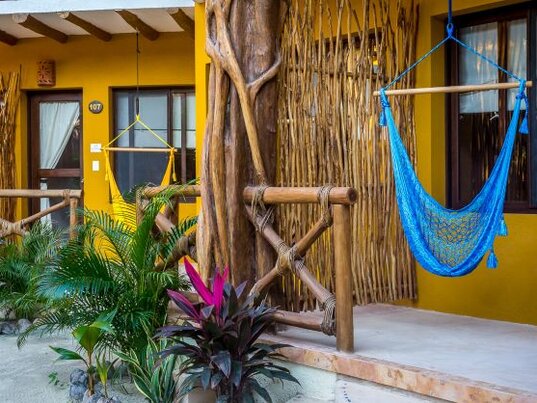 Veranda mit Hängematte im Holbox Dream Beach Front Hotel