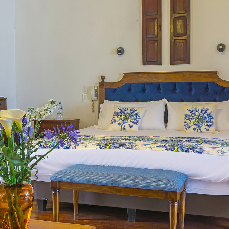 Ein Einzelzimmer im Hotel Hacienda Pinsaqui