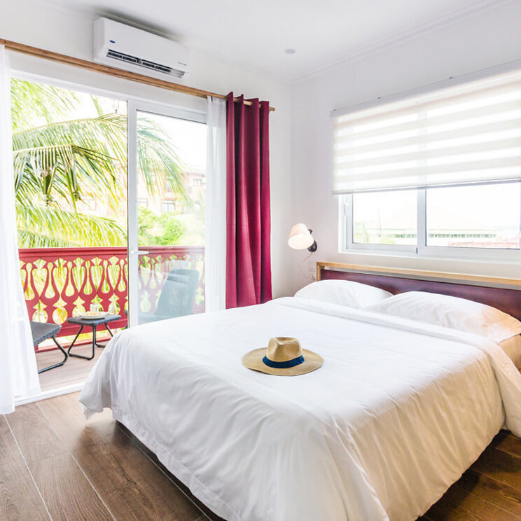 Doppelbett des Hotels Divers Paradise Boutique Hotel