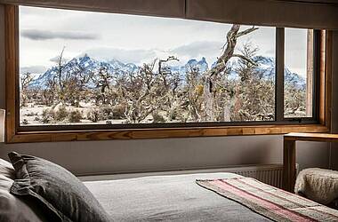 Panoramafenster im Doppelzimmer der Pampa Lodge