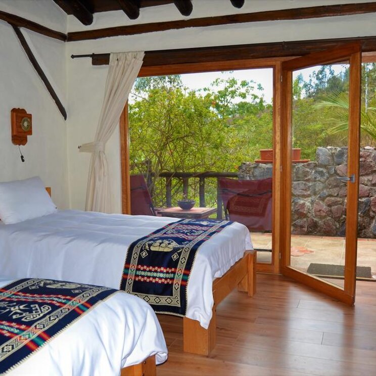Ein Zimmer mit Gartenblick im Hotel Ilatoa Lodge