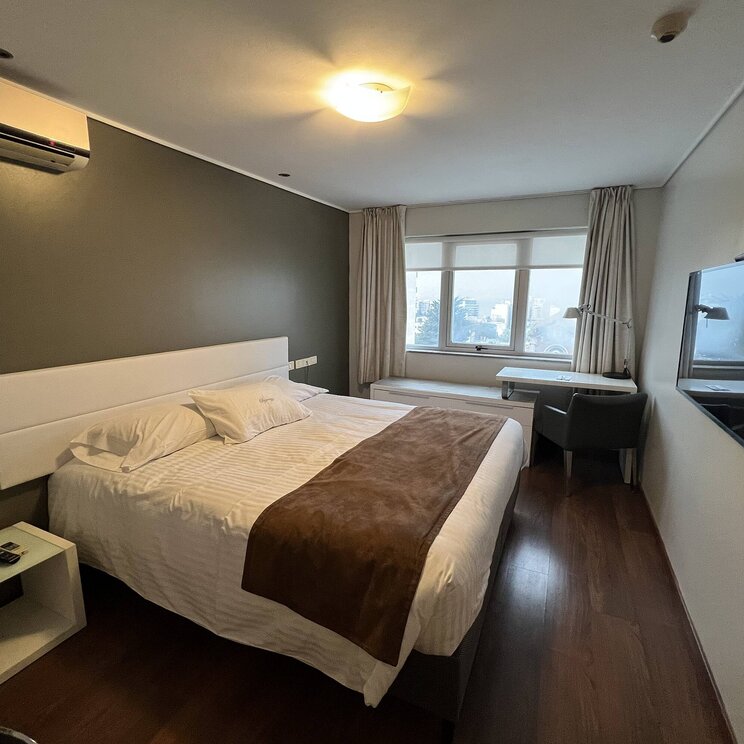 Ein Bettzimmer im Hotel Regency Golf Montevideo