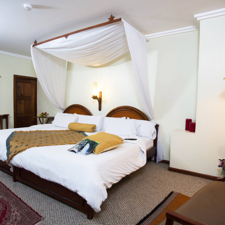 Ein Schlafzimmer im Hotel Carvallo