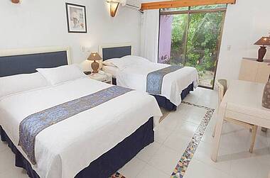 Doppelzimmer mit Gartenblick im Hotel Cocoplum Beach, San Andrés